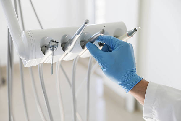 Professional Tooth Extraction technician working in Burleson County County, TX